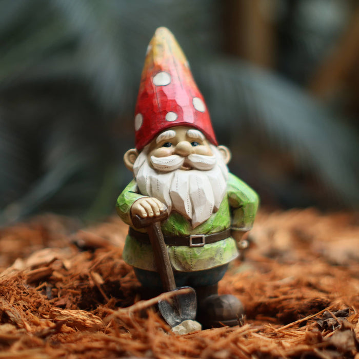 Colorful Gnome with Shovel in Garden
