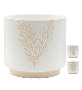 White planter with gold leaf design on a white background