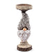 Decorative gnome candle holder on a white background